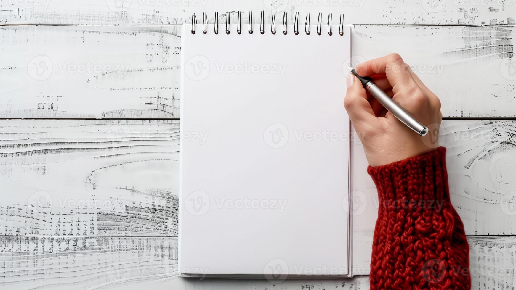 Hand Holding Pen and Empty Notebook. Writing Scene, Blank Journal, Stationery Object. photo