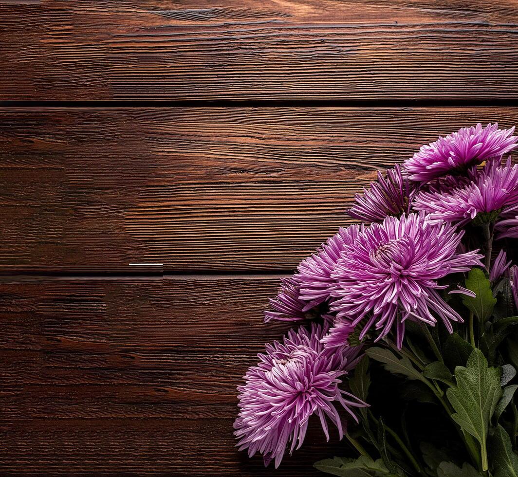 Bouquet of Purple Chrysanthemum on corner bottom right of vintage wooden table copy space, for florist or composing postcard photo