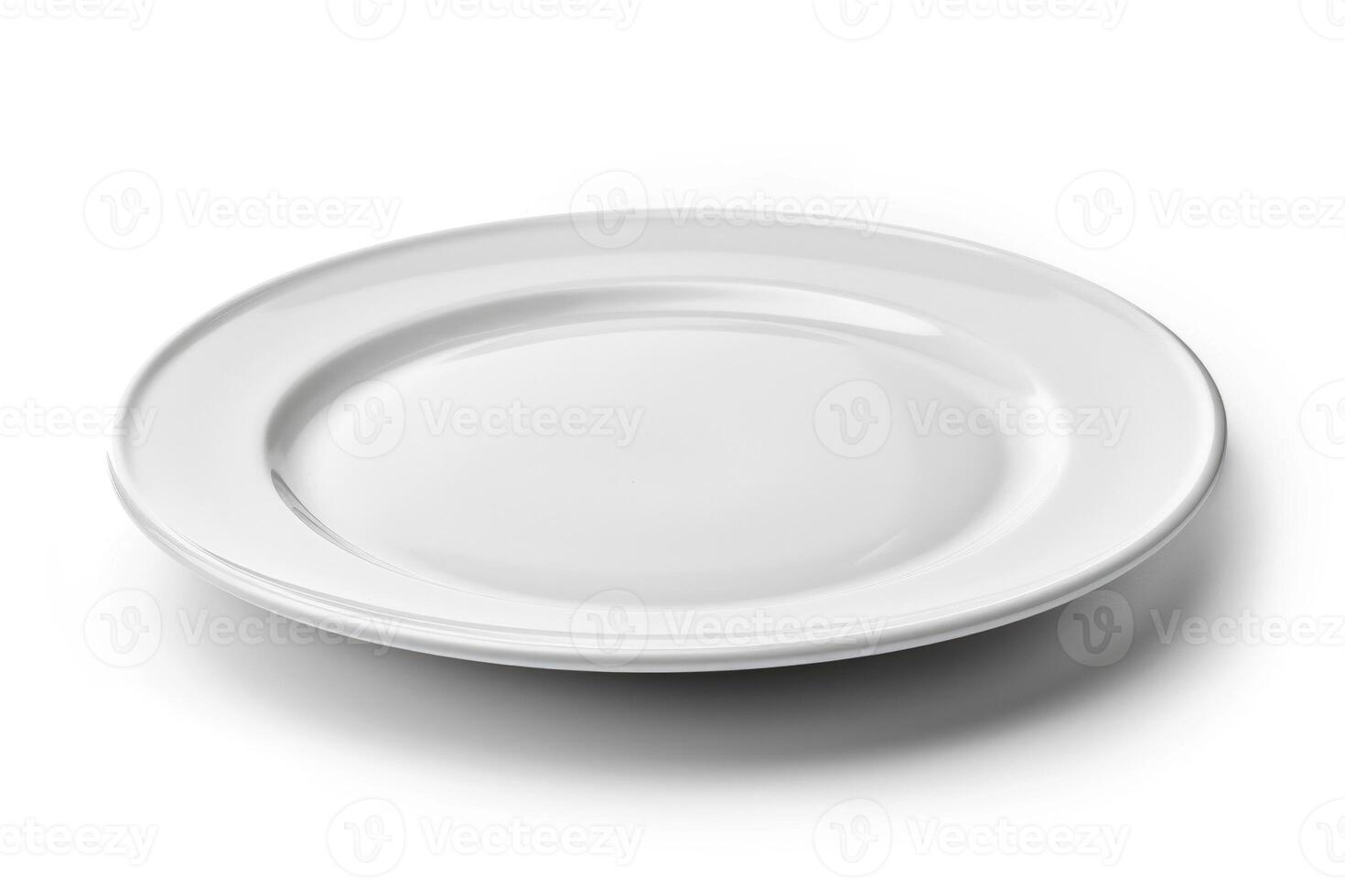 A white ceramic plate isolated on a white background. photo
