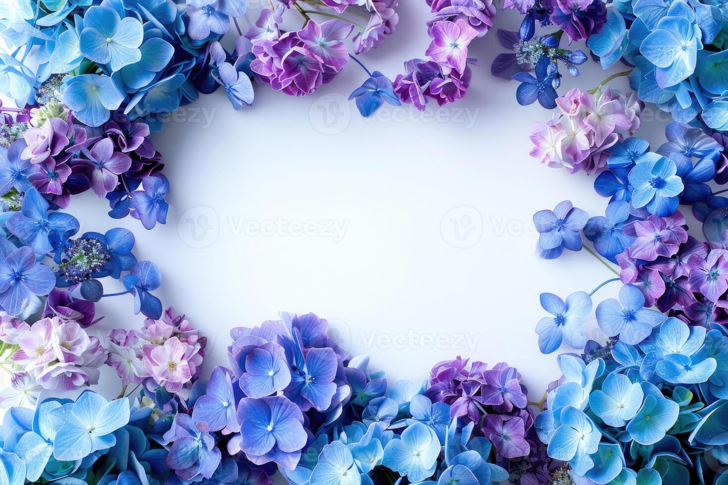 A floral banner with blue and purple flowers and a blank space for text in the center. photo