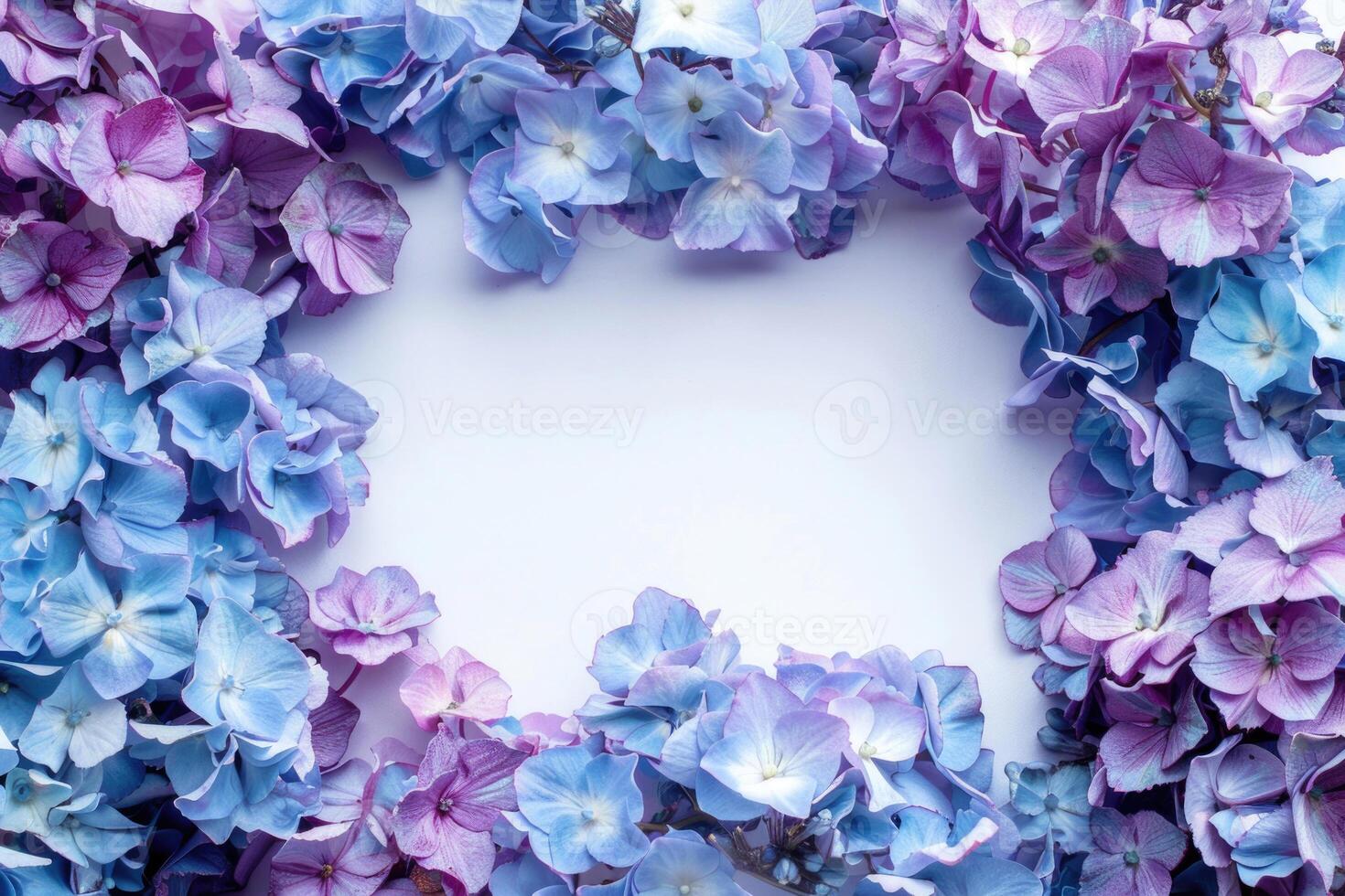 A floral banner with blue and purple flowers and a blank space for text in the center. photo