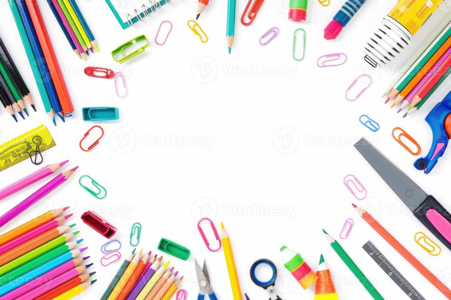 A clean white background with colorful school supplies around the edges. photo