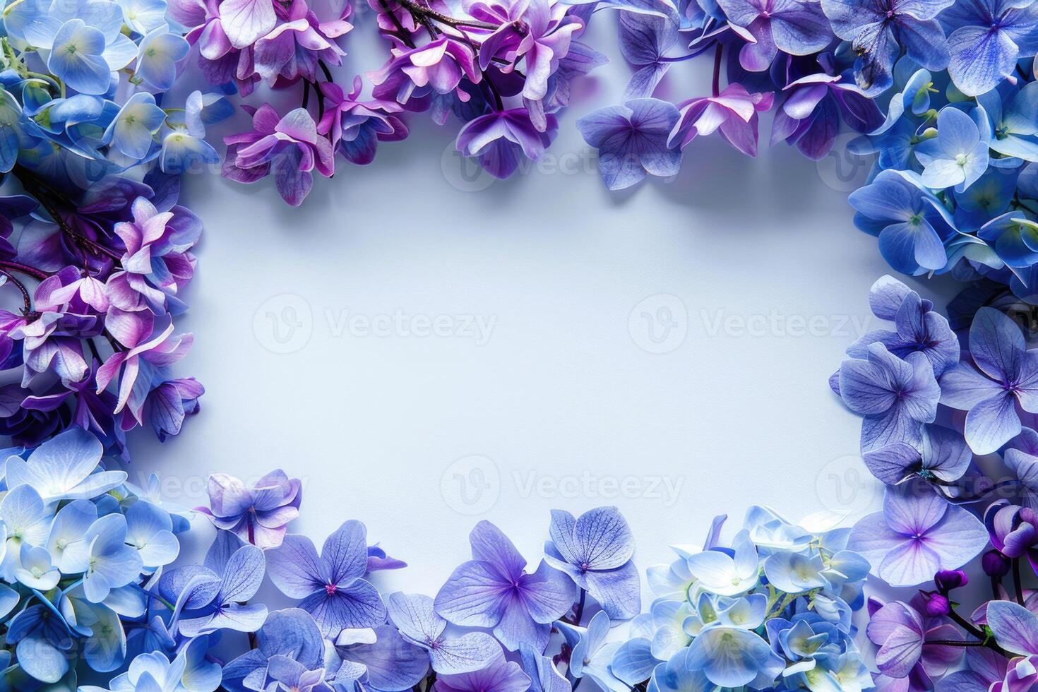 A floral banner with blue and purple flowers and a blank space for text in the center. photo
