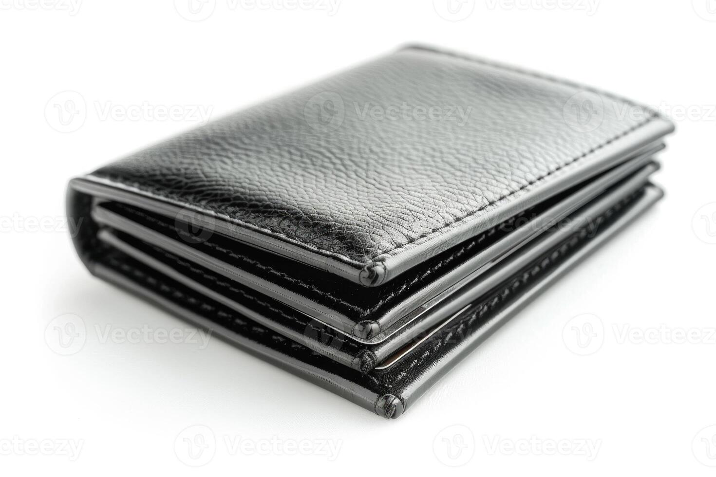 A black leather wallet isolated on a white background. photo