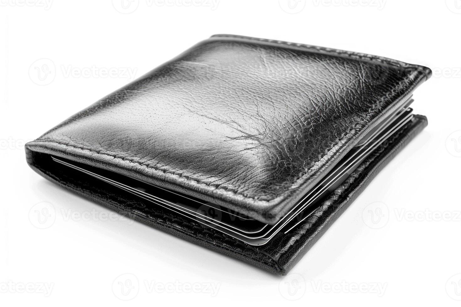 A black leather wallet isolated on a white background. photo