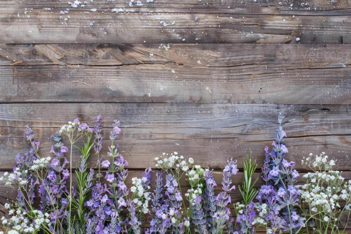 Rustic small flower bouquet with empty space on top. photo