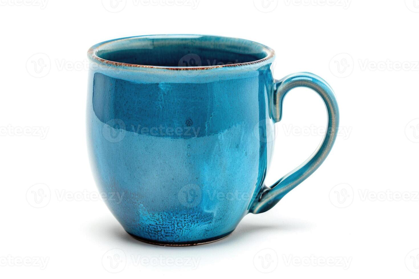 A blue ceramic mug isolated on a white background. photo