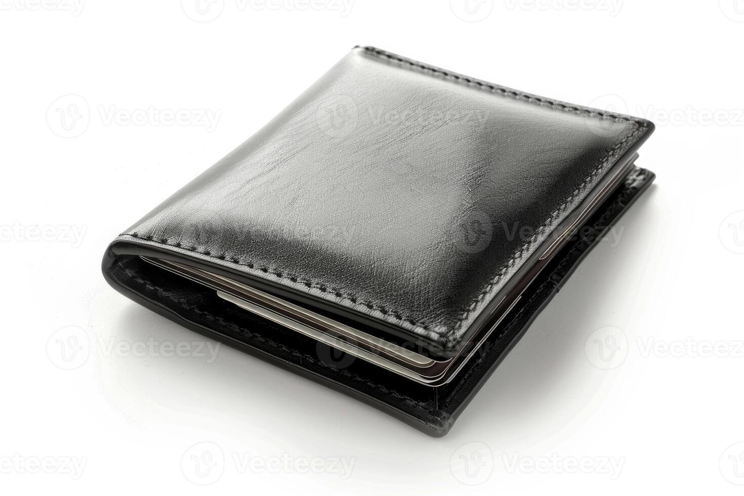 A black leather wallet isolated on a white background. photo