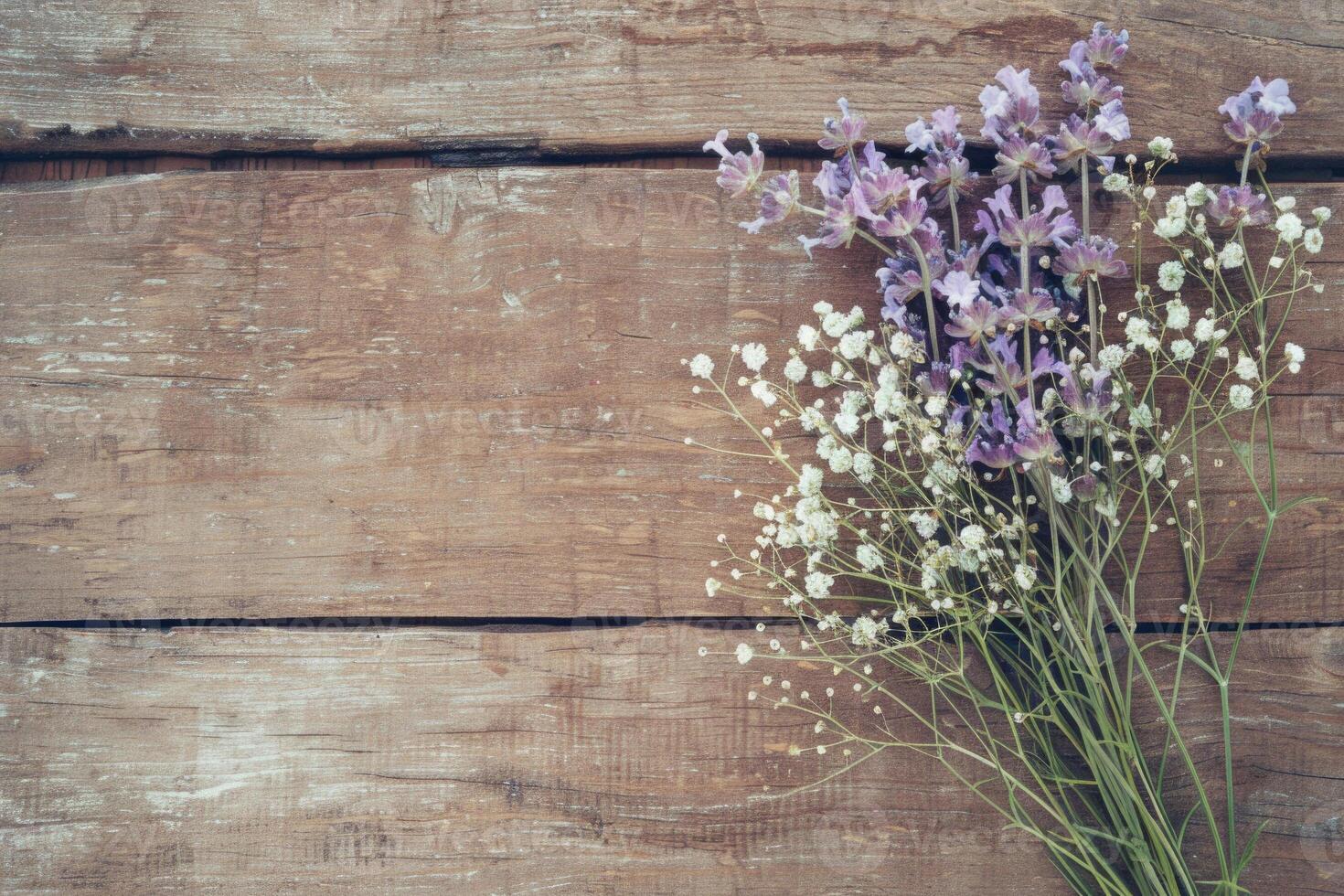 Rustic small flower bouquet with empty space on top. photo