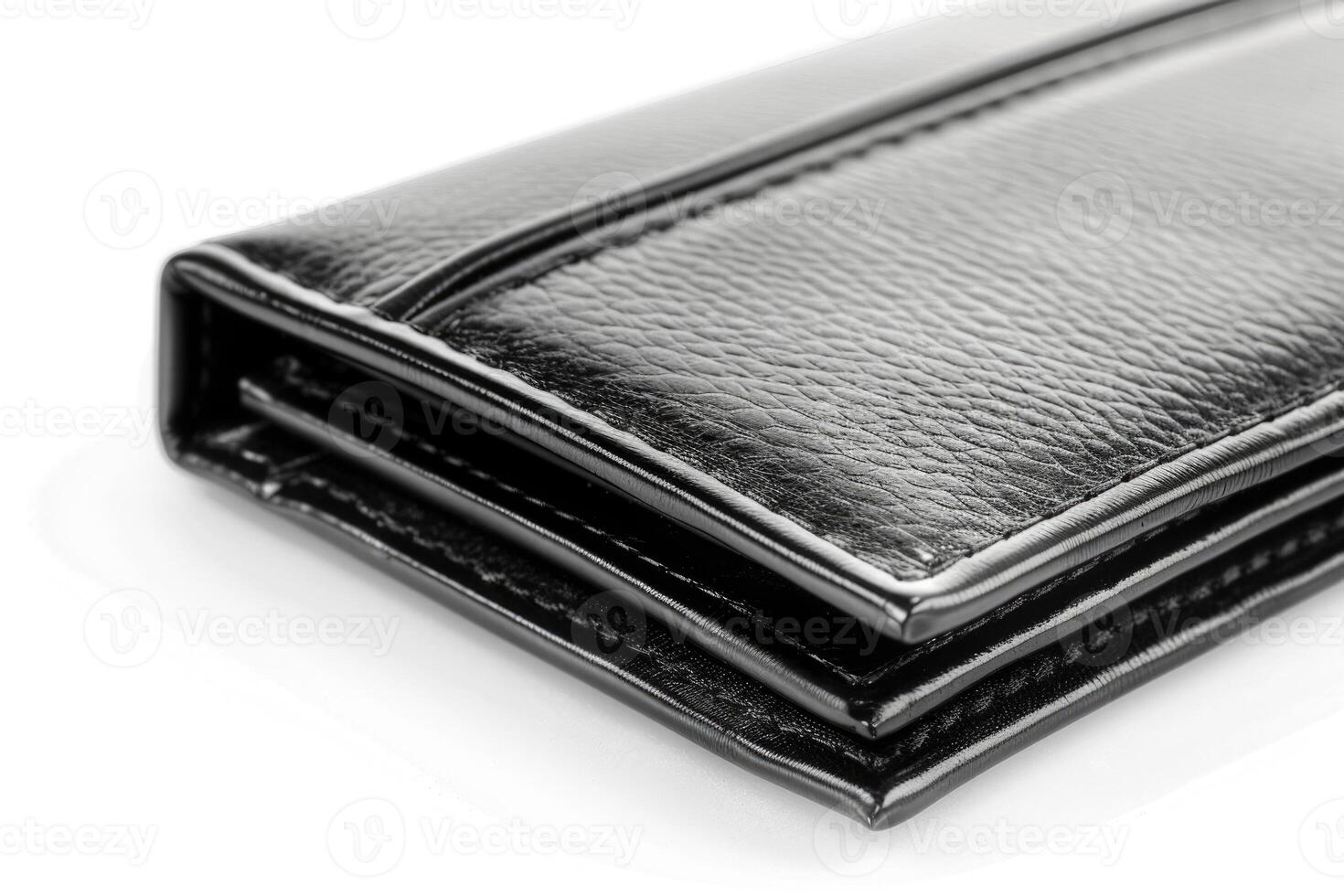 A black leather wallet isolated on a white background. photo