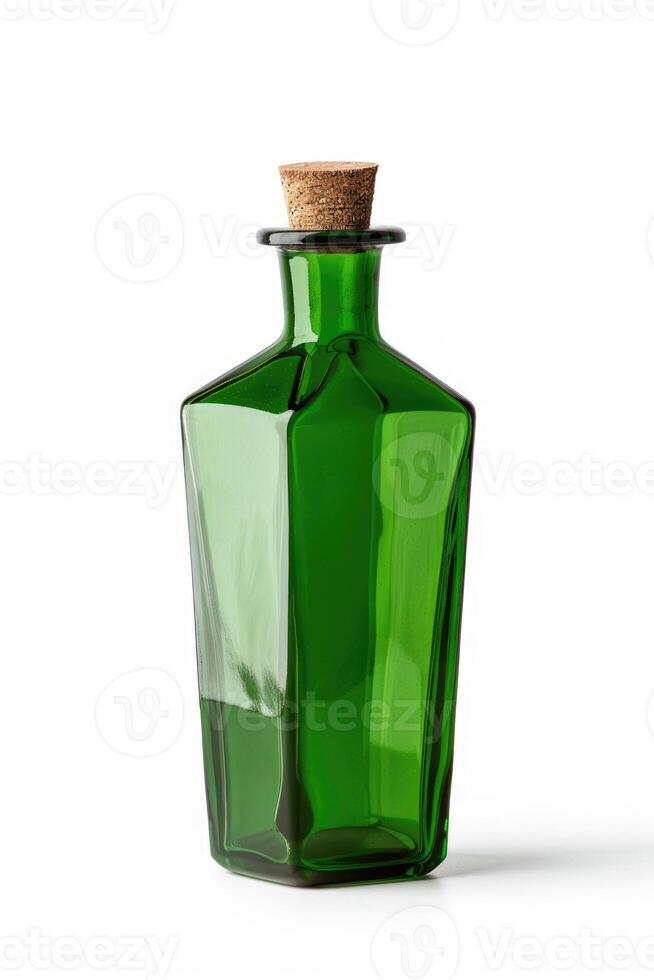 A green glass bottle isolated on a white background. photo