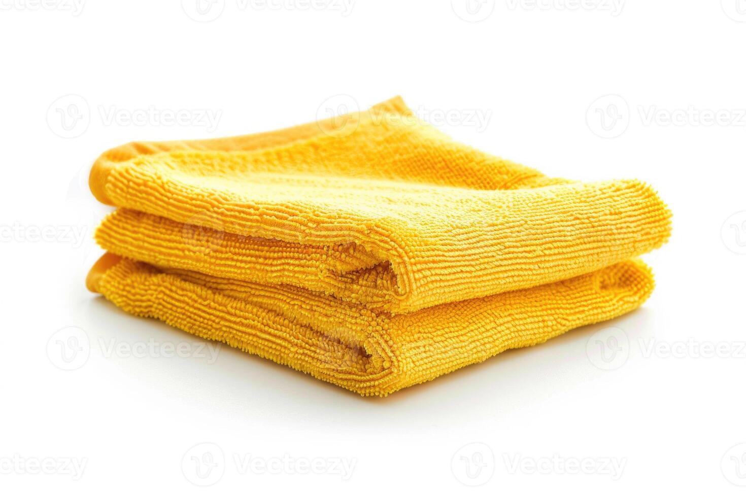 A yellow microfiber cleaning cloth isolated on a white background. photo