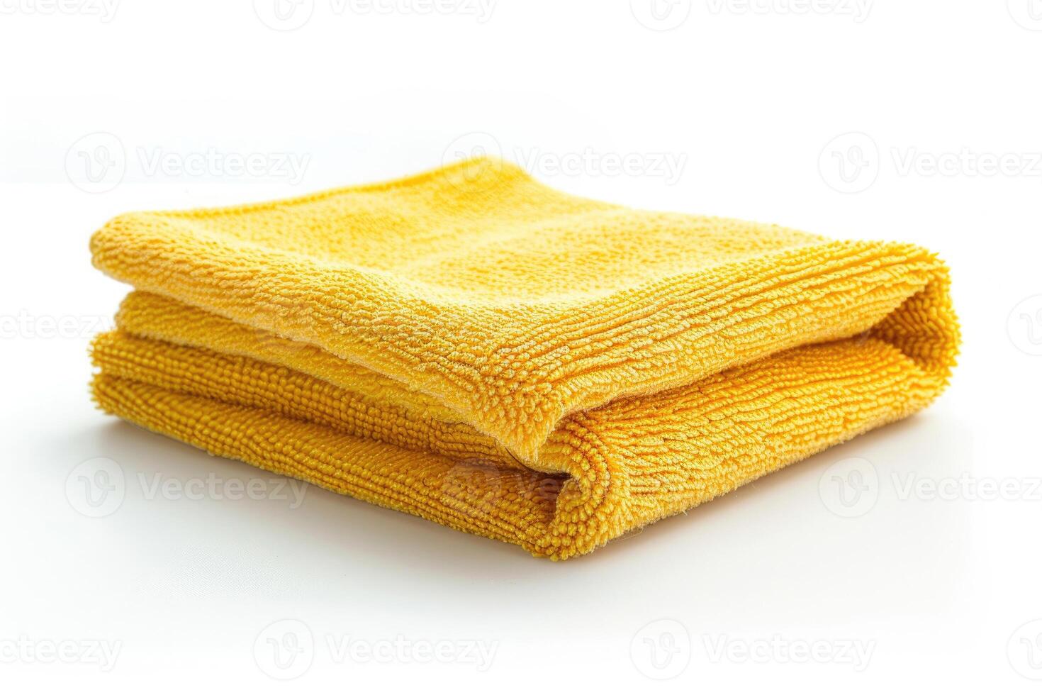 A yellow microfiber cleaning cloth isolated on a white background. photo