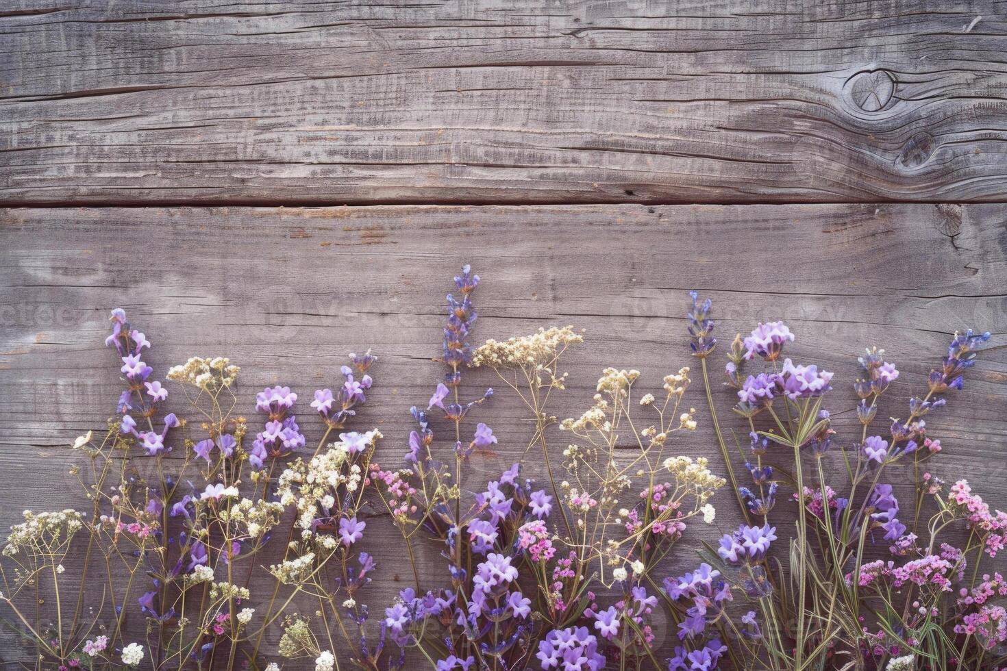 Rustic small flower bouquet with empty space on top. photo