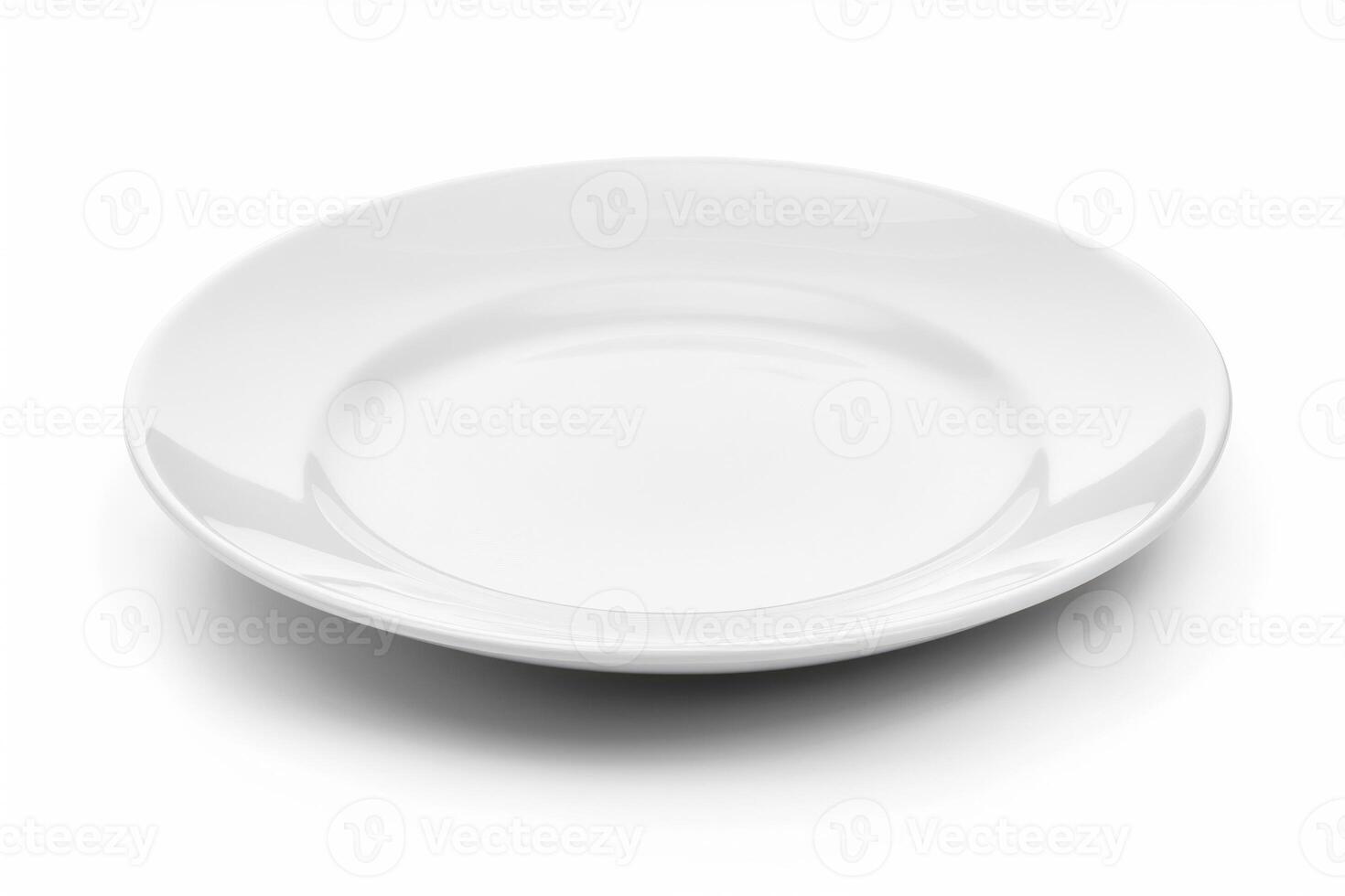 A white ceramic plate isolated on a white background. photo