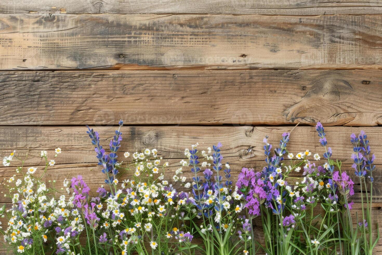 Rustic small flower bouquet with empty space on top. photo
