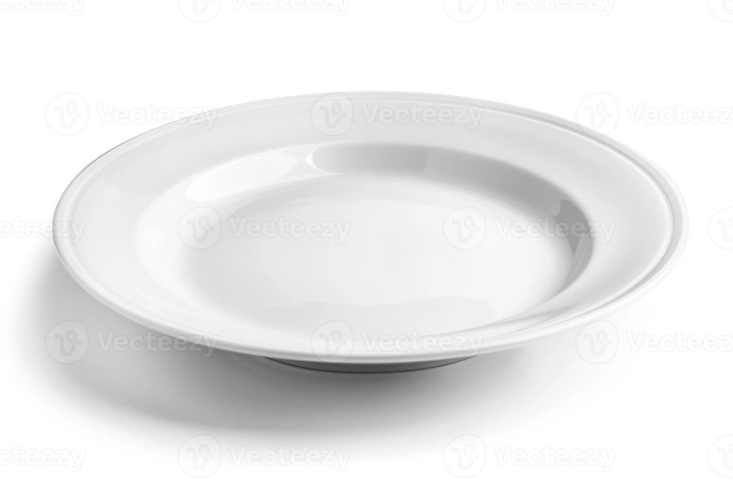A white ceramic plate isolated on a white background. photo