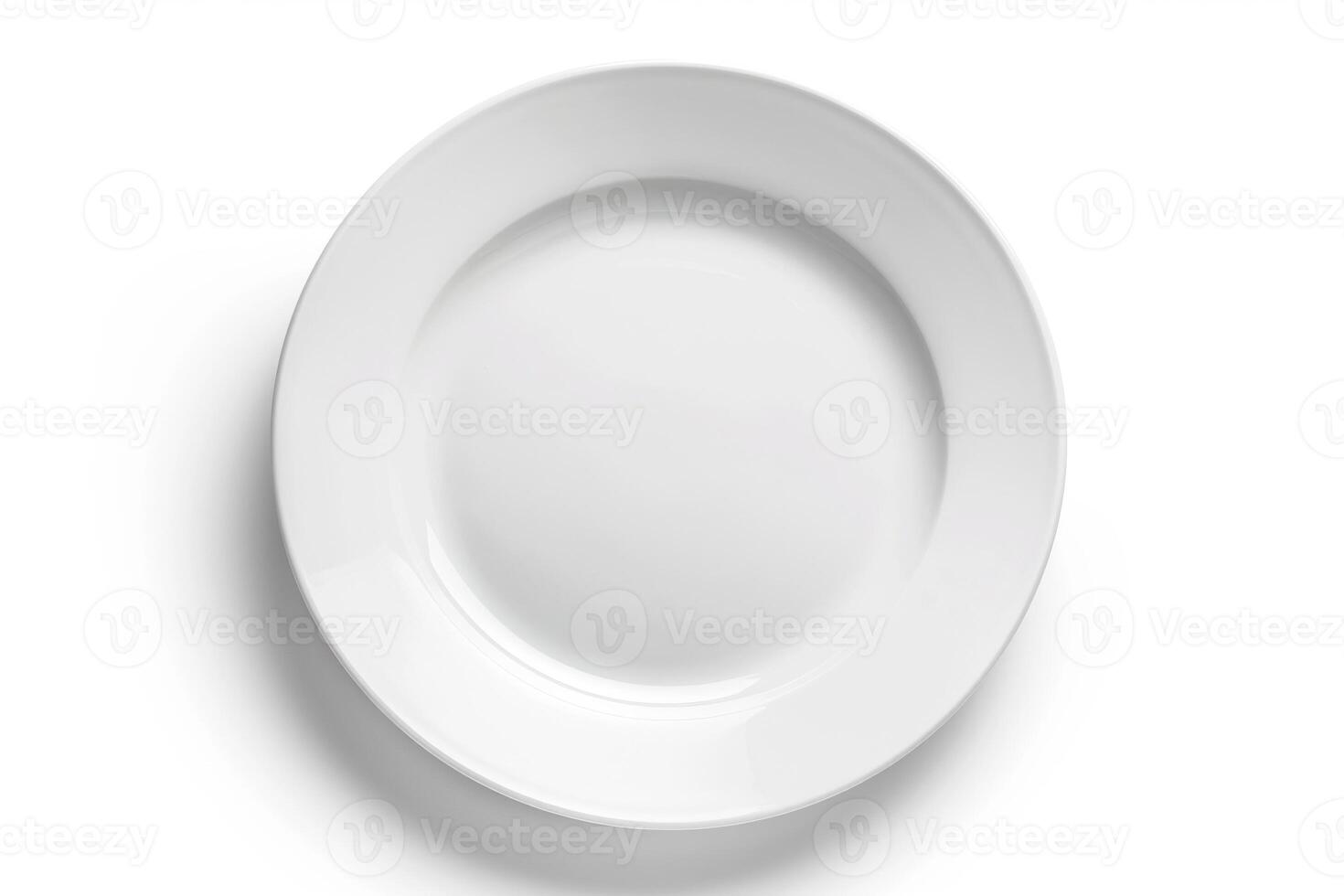 A white ceramic plate isolated on a white background. photo
