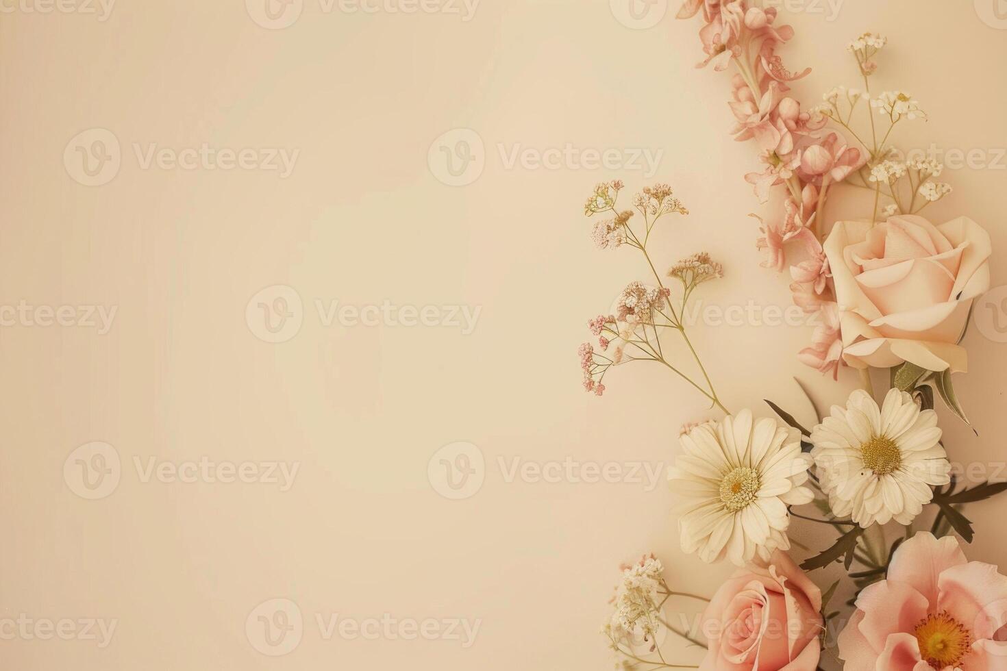 Small bouquet of pastel flowers with empty space on the left. photo