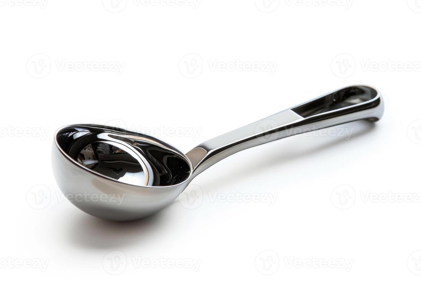 Stainless steel ice cream scoop on a white background. photo