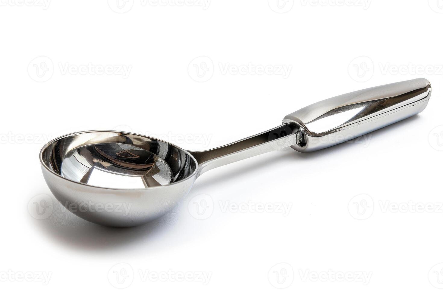 Stainless steel ice cream scoop on a white background. photo