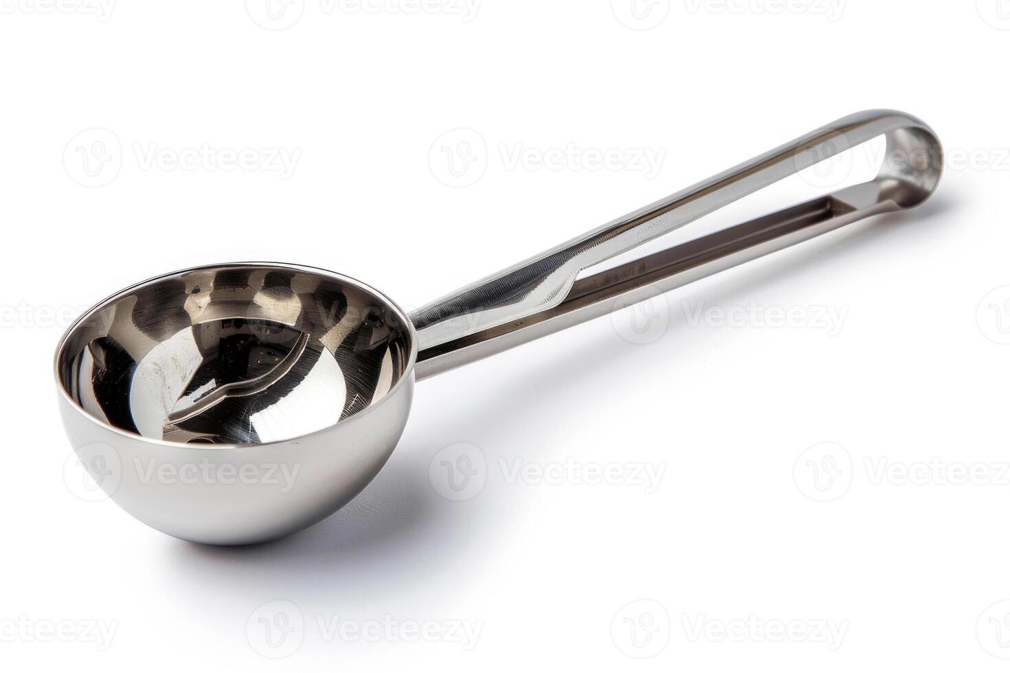 Stainless steel ice cream scoop on a white background. photo