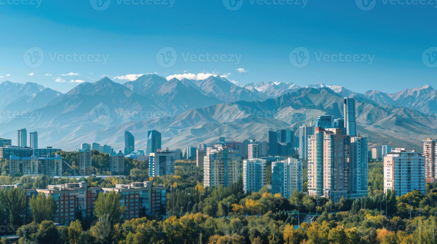A panoramic view of Almaty's skyline with the majestic mountains in the background. photo