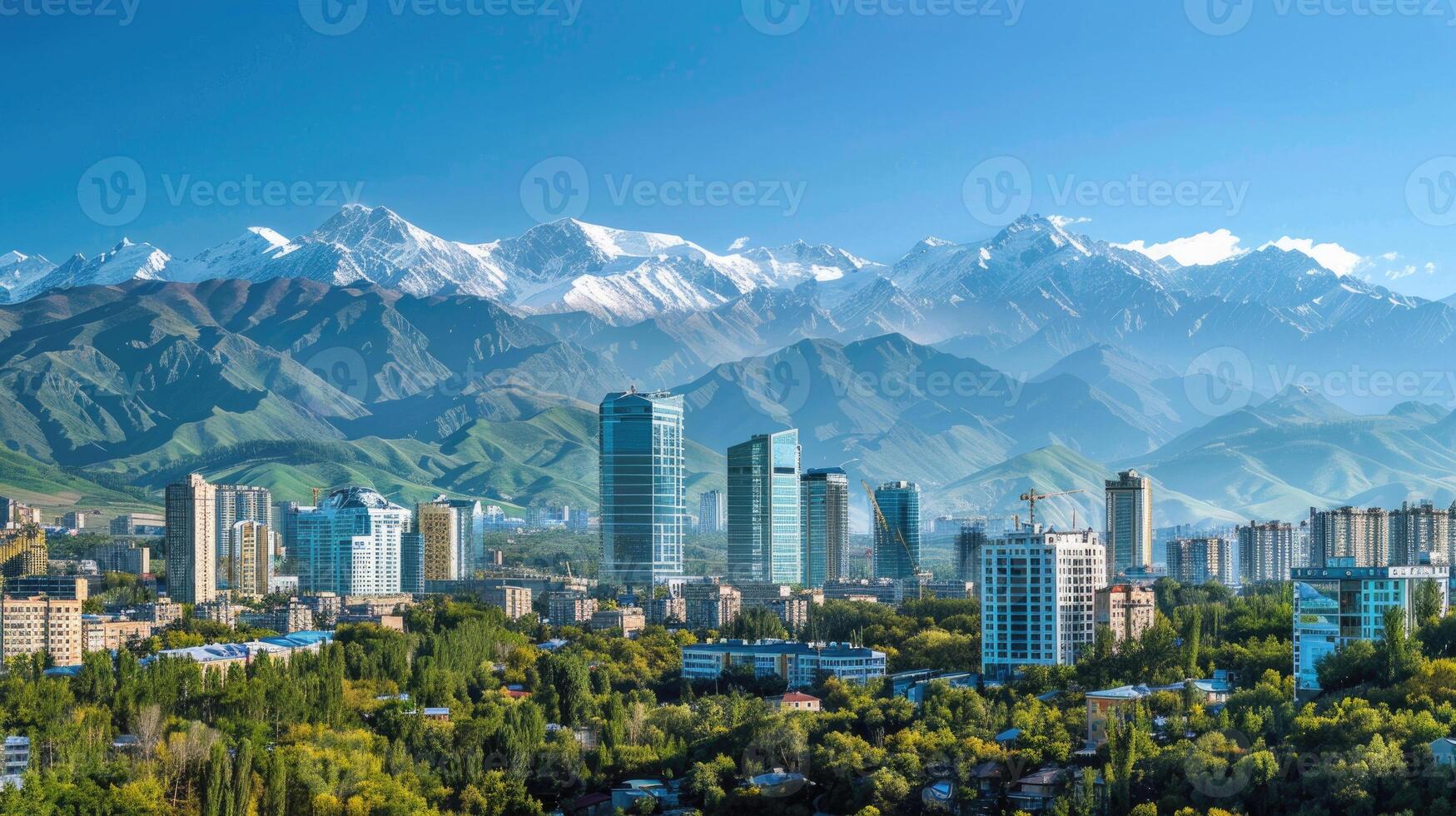 A panoramic view of Almaty's skyline with the majestic mountains in the background. photo