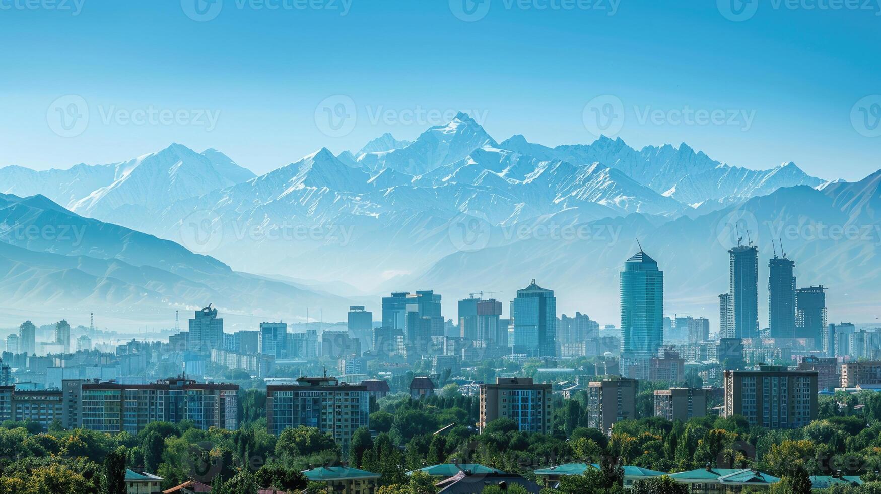 A panoramic view of Almaty's skyline with the majestic mountains in the background. photo