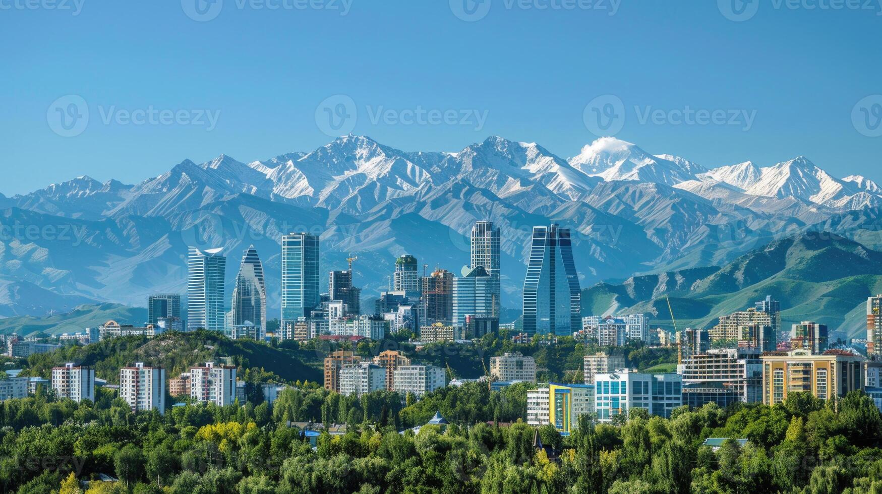 A panoramic view of Almaty's skyline with the majestic mountains in the background. photo