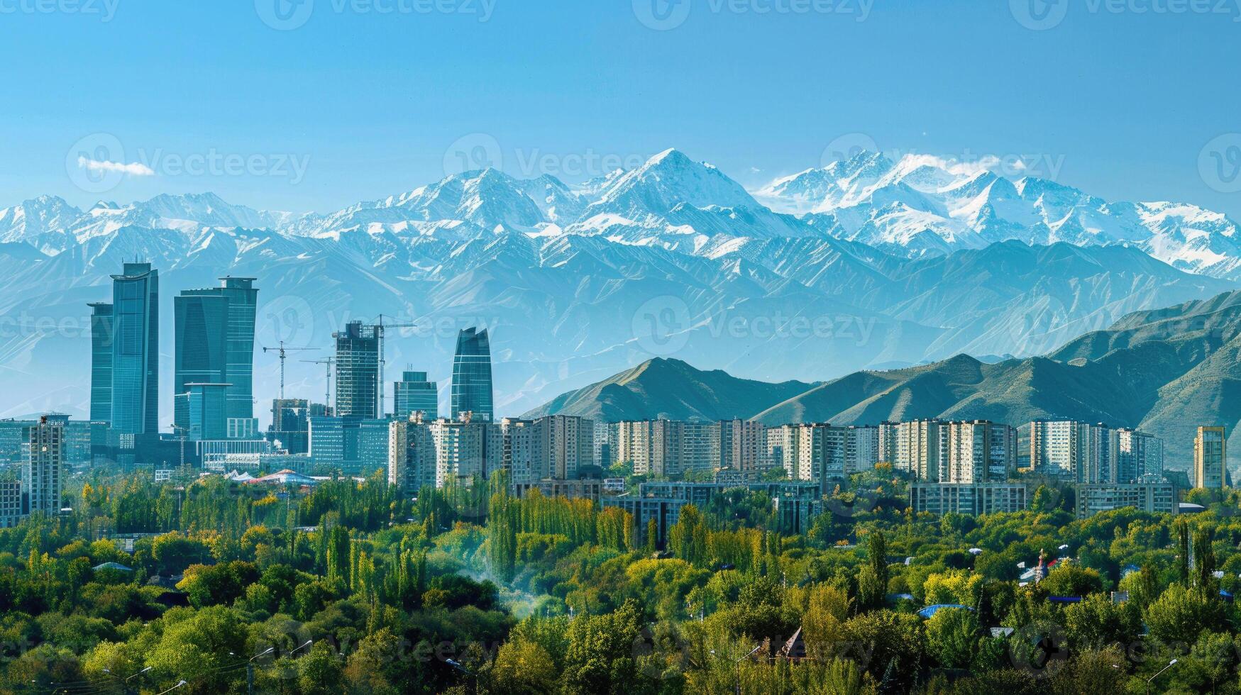 A panoramic view of Almaty's skyline with the majestic mountains in the background. photo