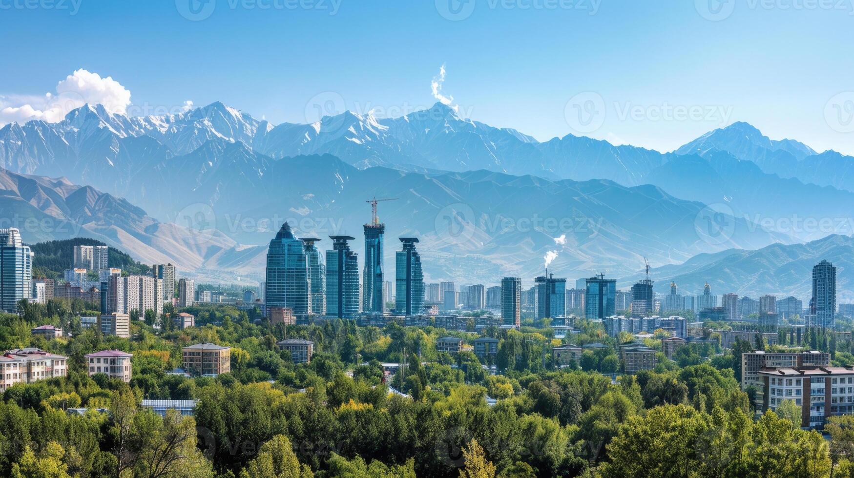 A panoramic view of Almaty's skyline with the majestic mountains in the background. photo