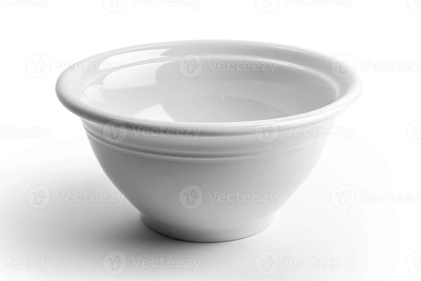 White ceramic mixing bowl on a white background. photo