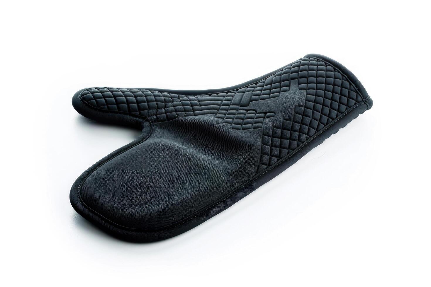 Black silicone oven mitt on a white background. photo