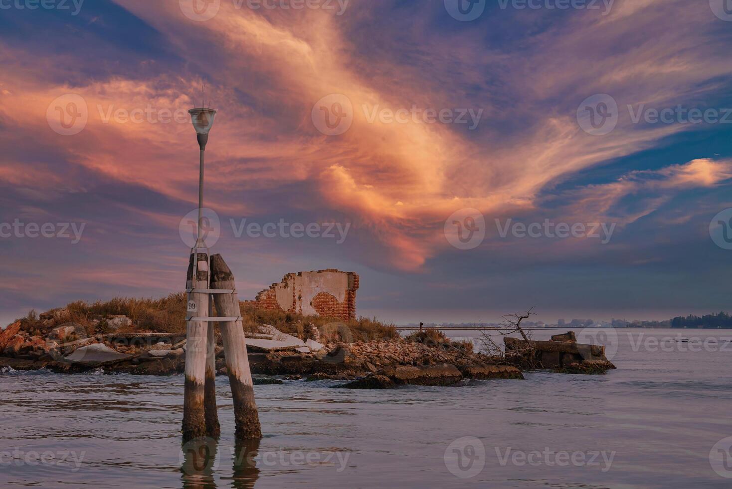 Venetian Light Post Standing Alone in the Water with No Reflections photo