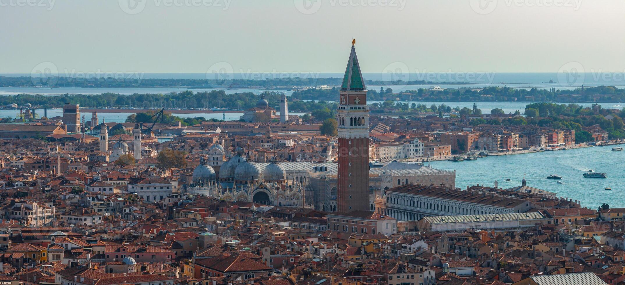 Aerial View of Venice near Saint Mark's Square, Rialto bridge and narrow canals. photo