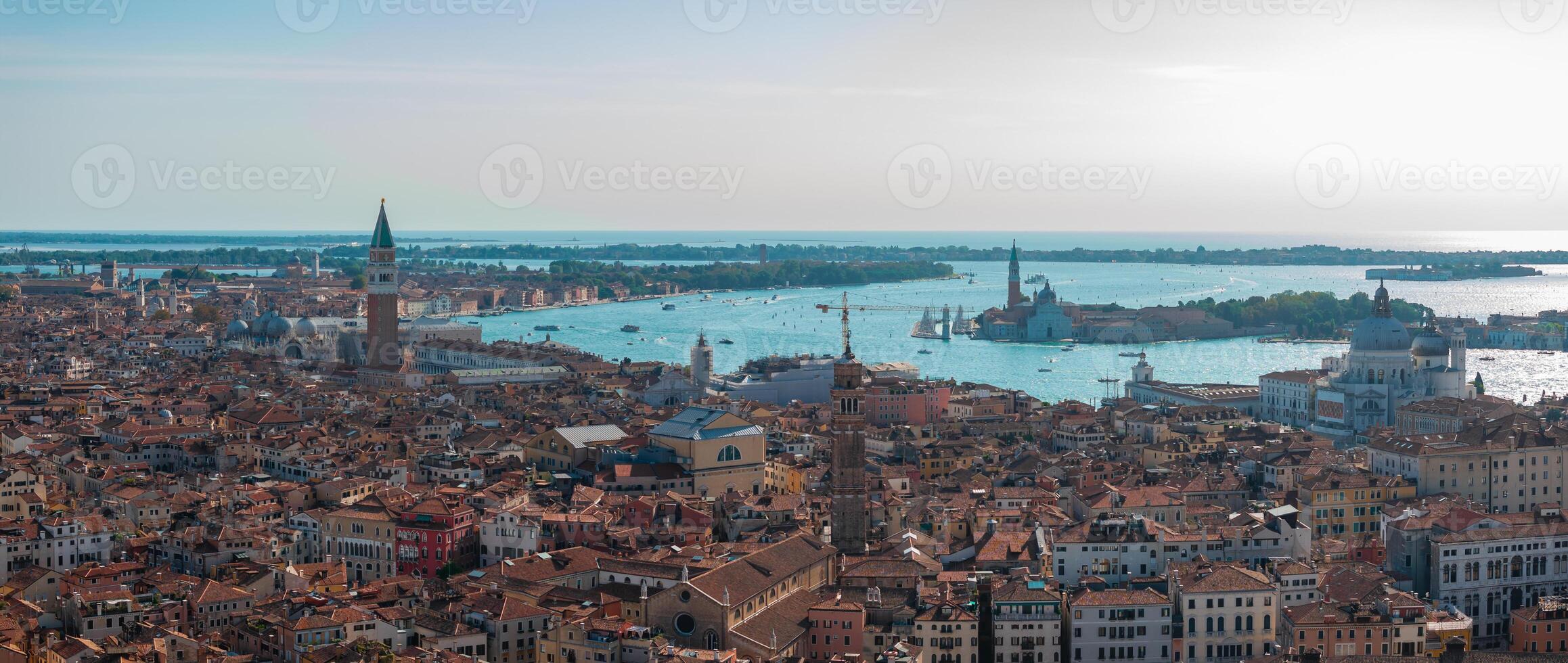 Aerial View of Venice near Saint Mark's Square, Rialto bridge and narrow canals. photo