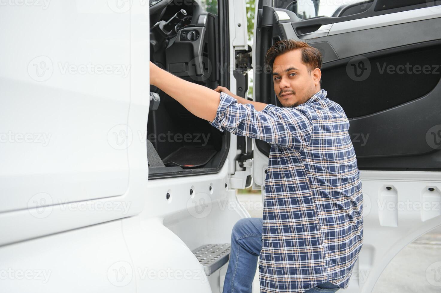 Portrait of a indian truck driver photo