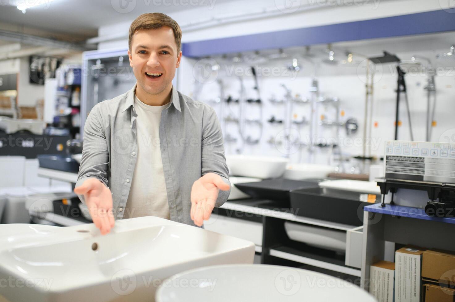 Man at the building market looking for sink into their bathroom photo