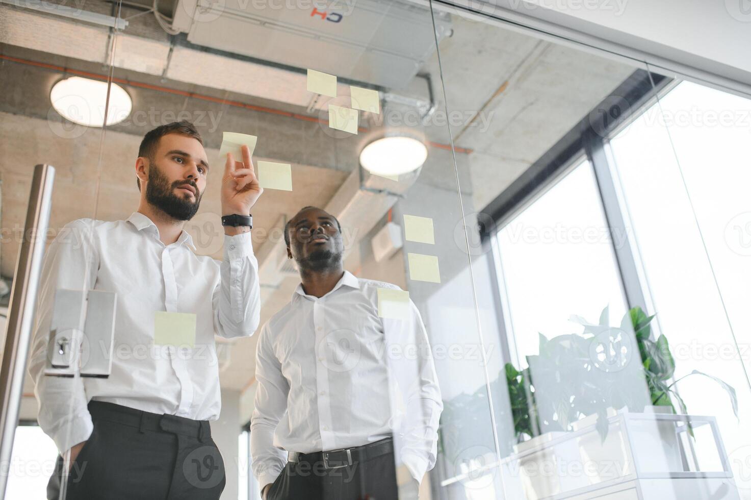 Corporate, sticky notes and business people planning a team mission, project or growth of business plan photo