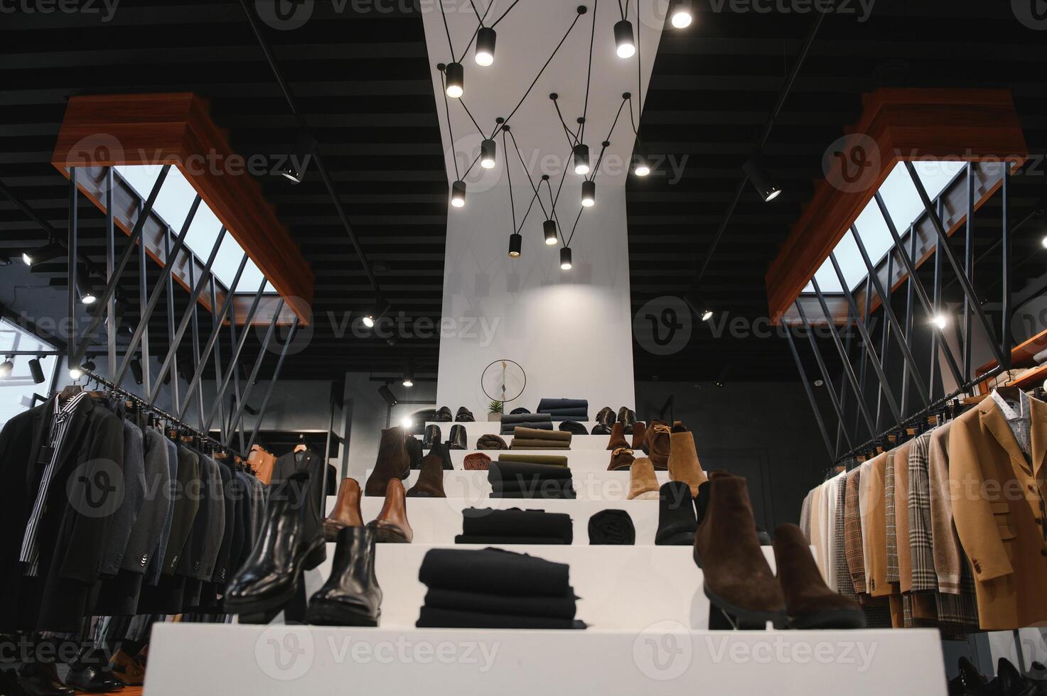 Modern luxury store with mens clothing inside shopping center photo