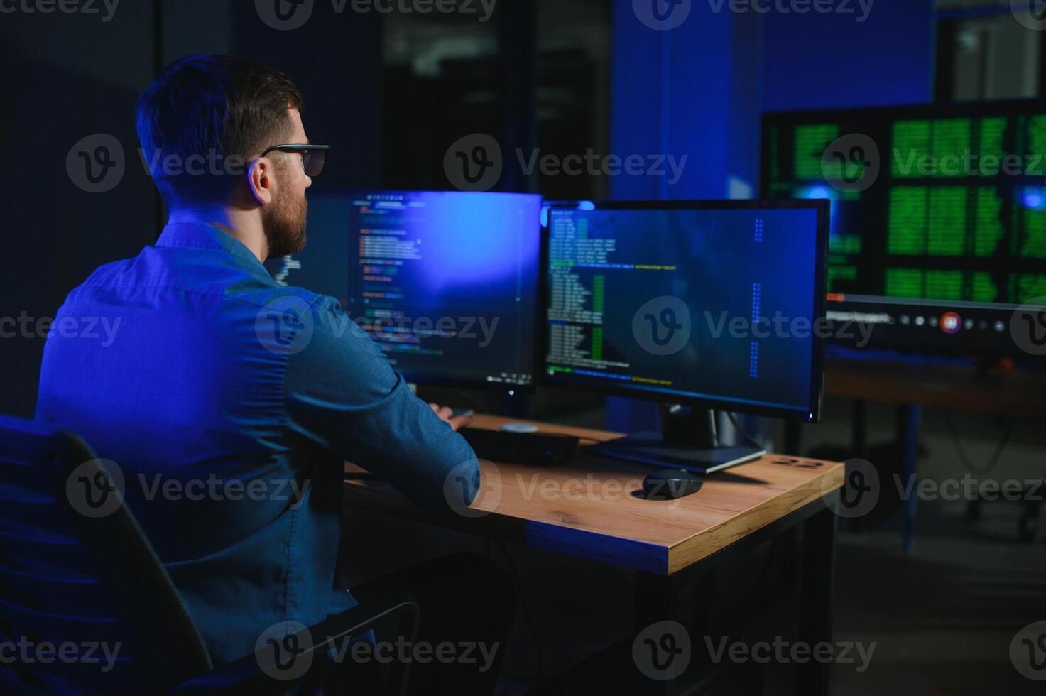 programmer working at desk in office photo