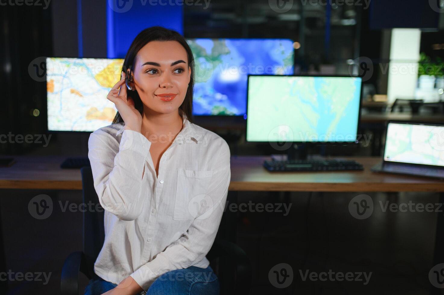 Photo of a successful dispatcher working on a computer in the office