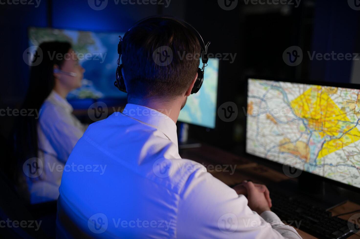 Diverse call center operators team use computers consulting clients in office photo