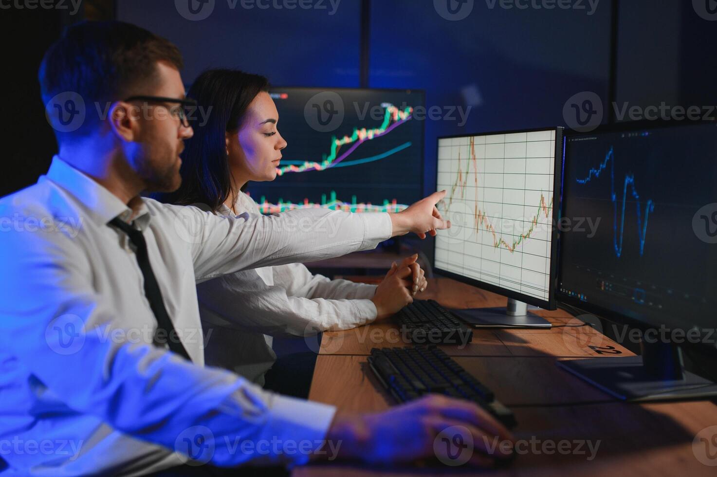 Business team investment working with computer, planning and analyzing graph stock market trading with stock chart data photo