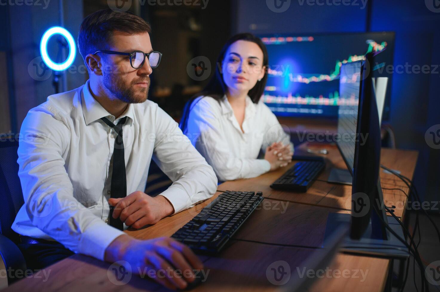 Business team investment working with computer, planning and analyzing graph stock market trading with stock chart data photo