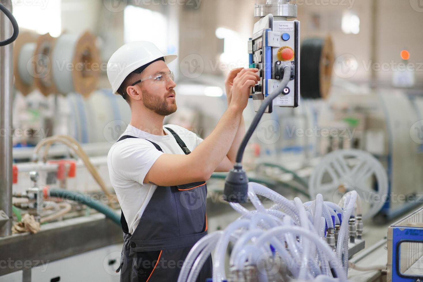 Factory worker. Man working on the production line photo