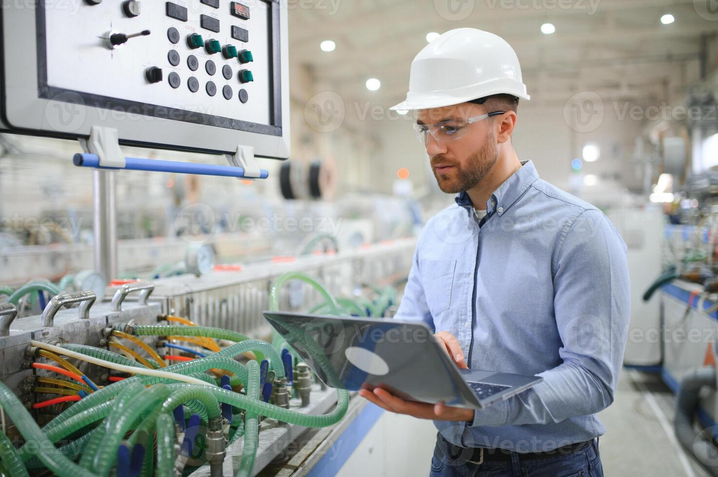 Engineer,Industry and construction concept. Portrait of caucasian Industry factory maintenance engineer photo