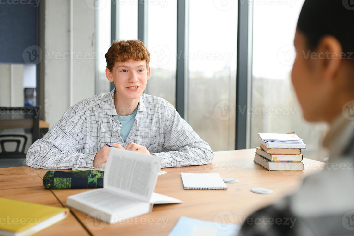 Students studying in library or classroom photo