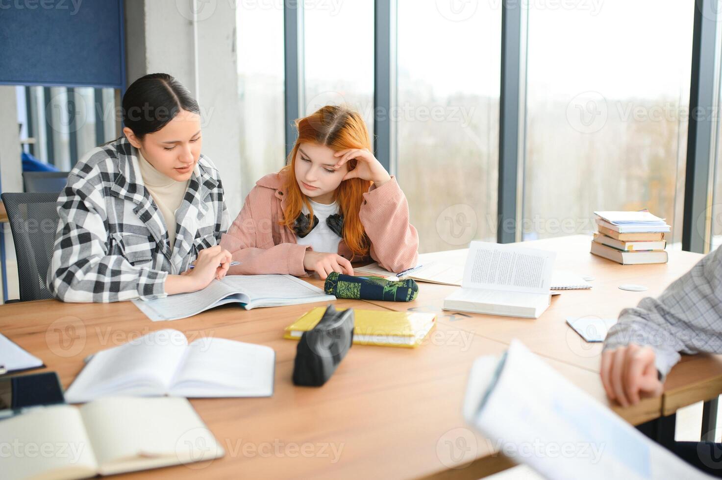 Students studying in library or classroom photo